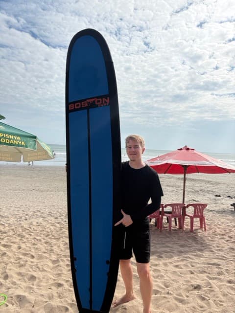 Lasse with a surfboard